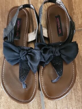 Material Girl Black Bow T-Strap Sandals with Rhinestone Detail